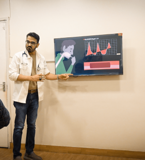 Dr. Ikram providing thyroid weight gain treatment in Karachi.