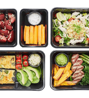 A top-down view of healthy meal prep containers showcasing small portions for The Light Diet.