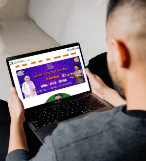 A patient viewing Dr. Ikram's diet and weight loss website on a laptop, consulting an online doctor in Pakistan from the comfort of their home.