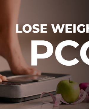 A person's feet on a weight scale next to an apple, measuring tape, and dumbbells, illustrating PCOS weight loss strategies.